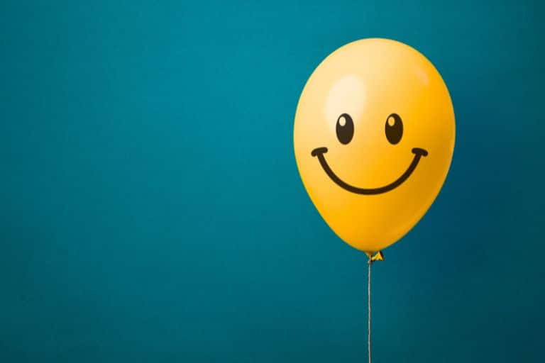 yellow balloon with smilie face