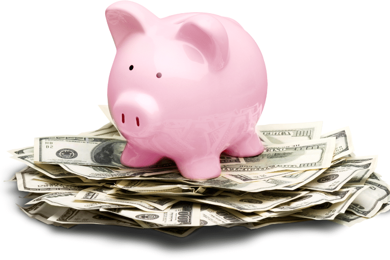 pink piggy bank on pile of dollars